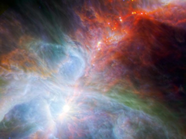 This new view of the Orion nebula highlights fledgling stars hidden in the gas and clouds. Image credit: NASA/ESA/JPL-Caltech/IRAM This new view of the Orion nebula highlights fledgling stars hidden in the gas and clouds. Image credit: NASA/ESA/JPL-Caltech/IRAM