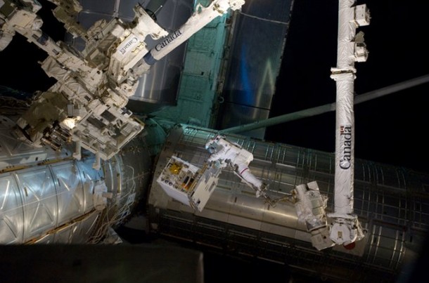 On July 12, 2011, spacewalking astronauts Mike Fossum and Ron Garan successfully transferred the Robotic Refueling Mission module from the Atlantis shuttle cargo bay to a temporary platform on the International Space Station's Dextre robot. (NASA) On July 12, 2011, spacewalking astronauts Mike Fossum and Ron Garan successfully transferred the Robotic Refueling Mission module from the Atlantis shuttle cargo bay to a temporary platform on the International Space Station's Dextre robot. (NASA)