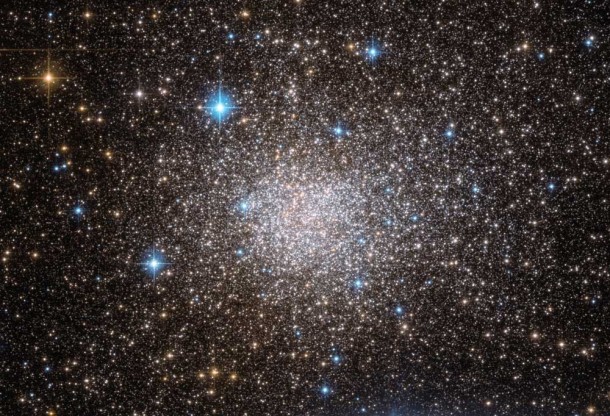 Terzan 5, which hosts the T5X2 system, is a dense globular star cluster located 25,000 light-years away toward the constellation Sagittarius. Credit: ESA/Hubble and NASA Terzan 5, which hosts the T5X2 system, is a dense globular star cluster located 25,000 light-years away toward the constellation Sagittarius. Credit: ESA/Hubble and NASA