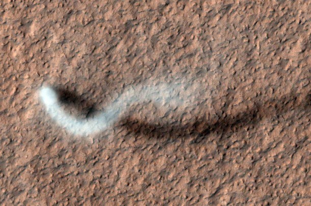 A towering dust devil casts a serpentine shadow over the Martian surface in this image acquired by the High Resolution Imaging Science Experiment (HiRISE) camera on NASA's Mars Reconnaissance Orbiter. Image credit: NASA/JPL-Caltech/Univ. of Arizona A towering dust devil casts a serpentine shadow over the Martian surface in this image acquired by the High Resolution Imaging Science Experiment (HiRISE) camera on NASA's Mars Reconnaissance Orbiter. Image credit: NASA/JPL-Caltech/Univ. of Arizona