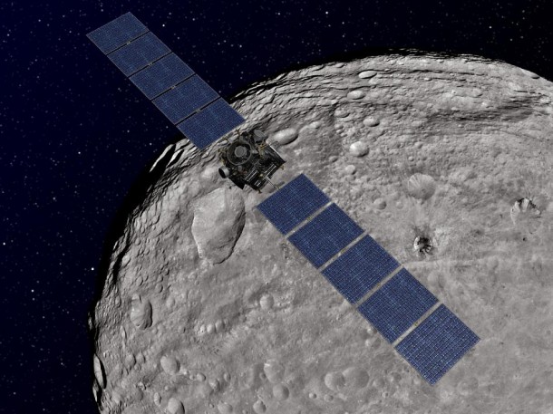 This artist's concept shows NASA's Dawn spacecraft orbiting the giant asteroid Vesta. The depiction of Vesta is based on images obtained by Dawn's framing cameras. Image credit: NASA/JPL-Caltech This artist's concept shows NASA's Dawn spacecraft orbiting the giant asteroid Vesta. The depiction of Vesta is based on images obtained by Dawn's framing cameras. Image credit: NASA/JPL-Caltech