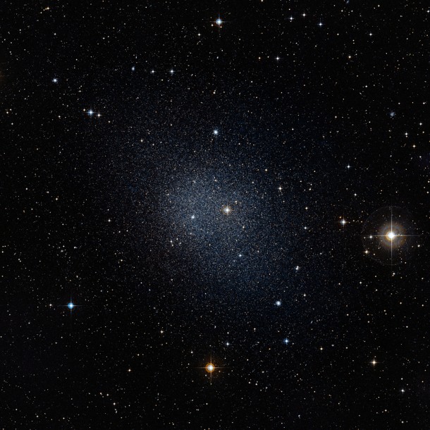 This dwarf spheroidal galaxy in the constellation Fornax is a satellite of our Milky Way and is one of 10 used in Fermi's dark matter search. The motions of the galaxy's stars indicate that it is embedded in a massive halo of matter that cannot be seen. (Credit: ESO/Digital Sky Survey 2) This dwarf spheroidal galaxy in the constellation Fornax is a satellite of our Milky Way and is one of 10 used in Fermi's dark matter search. The motions of the galaxy's stars indicate that it is embedded in a massive halo of matter that cannot be seen. (Credit: ESO/Digital Sky Survey 2)