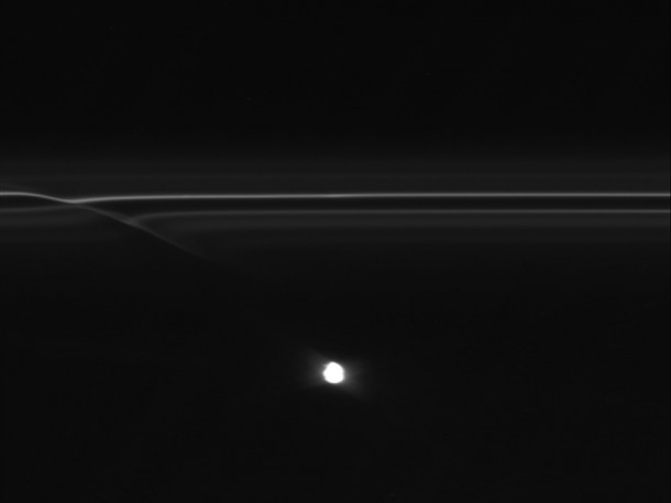 Images from NASA's Cassini spacecraft have revealed half-mile-sized (kilometer-sized) objects punching through parts of Saturn's F ring, leaving glittering trails behind them. These trails in the rings, which scientists are calling "mini-jets," fill in a missing link in our story of the curious behavior of the F ring. Images from NASA's Cassini spacecraft have revealed half-mile-sized (kilometer-sized) objects punching through parts of Saturn's F ring, leaving glittering trails behind them. These trails in the rings, which scientists are calling "mini-jets," fill in a missing link in our story of the curious behavior of the F ring.