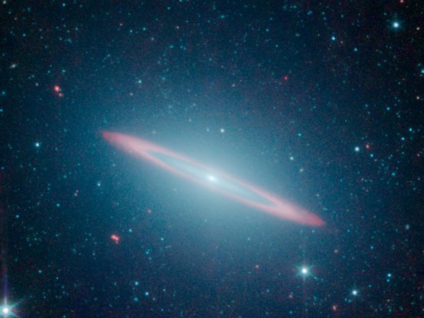 The infrared vision of NASA's Spitzer Space Telescope has revealed that the Sombrero galaxy -- named after its appearance in visible light to a wide-brimmed hat -- is in fact two galaxies in one. Image credit: NASA/JPL-Caltech The infrared vision of NASA's Spitzer Space Telescope has revealed that the Sombrero galaxy -- named after its appearance in visible light to a wide-brimmed hat -- is in fact two galaxies in one. Image credit: NASA/JPL-Caltech