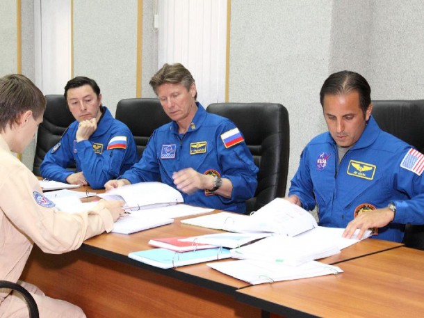 Expedition 31 Flight Engineers Sergei Revin (left), Gennady Padalka and Joe Acaba (right) review launch and docking flight plans at their Cosmonaut Hotel crew quarters in Baikonur, Kazakhstan. Credit: NASA/Victor Zelentsov Expedition 31 Flight Engineers Sergei Revin (left), Gennady Padalka and Joe Acaba (right) review launch and docking flight plans at their Cosmonaut Hotel crew quarters in Baikonur, Kazakhstan. Credit: NASA/Victor Zelentsov