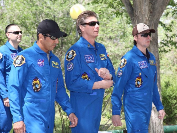 Expedition 31 Flight Engineers Joe Acaba (second from the left), Gennady Padalka and Sergei Revin (right) take a traditional stroll down the Walk of the Cosmonauts at their Cosmonaut Hotel crew quarters in Baikonur, Kazakhstan. Backup crew member Evgeny Tarelkin (far left) is behind them. Credit: NASA/Victor Zelentsov Expedition 31 Flight Engineers Joe Acaba (second from the left), Gennady Padalka and Sergei Revin (right) take a traditional stroll down the Walk of the Cosmonauts at their Cosmonaut Hotel crew quarters in Baikonur, Kazakhstan. Backup crew member Evgeny Tarelkin (far left) is behind them. Credit: NASA/Victor Zelentsov