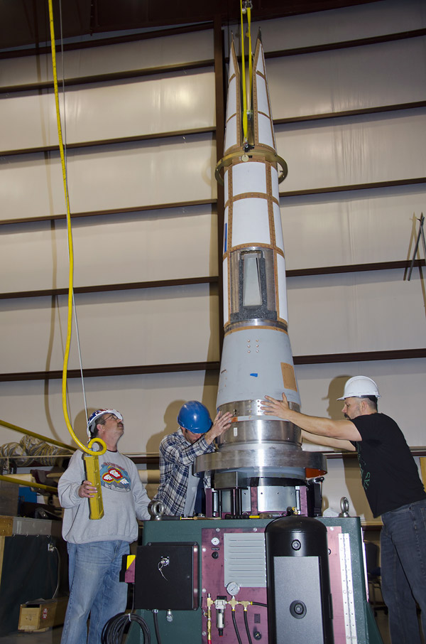 Technicians mount the Hypersonic International Flight Research Experimentation (HIFiRE) Flight 2 research vehicle on a turntable for weight distribution evaluations at a White Sands Missile Range (WSMR) facility. Credit: WSMR/John Hamilton Technicians mount the Hypersonic International Flight Research Experimentation (HIFiRE) Flight 2 research vehicle on a turntable for weight distribution evaluations at a White Sands Missile Range (WSMR) facility. Credit: WSMR/John Hamilton