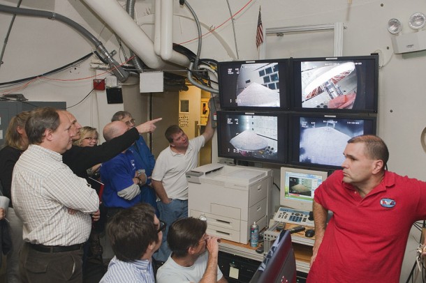 IRVE-3 team members crowd the control of the Transonic Dynamics Tunnel at NASA's Langley Research Center during the complete inflation system test of IRVE-3 flight hardware. Credit: NASA/Sean Smith IRVE-3 team members crowd the control of the Transonic Dynamics Tunnel at NASA's Langley Research Center during the complete inflation system test of IRVE-3 flight hardware. Credit: NASA/Sean Smith