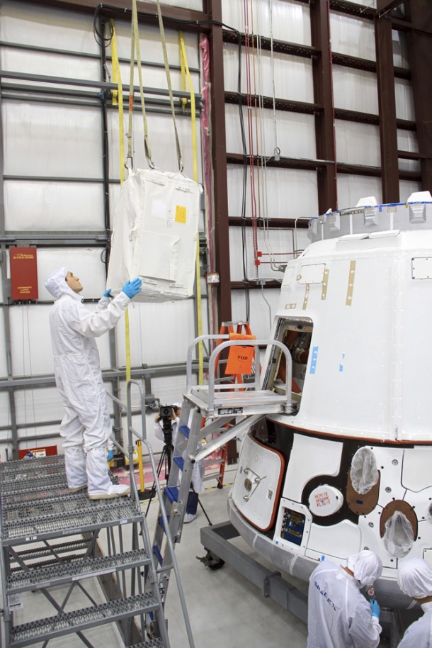 A technician guides a cargo bag into the Dragon spacecraft at the SpaceX facility at Cape Canaveral Air Force Station, Fla. Photo credit: NASA/Jim Grossmann A technician guides a cargo bag into the Dragon spacecraft at the SpaceX facility at Cape Canaveral Air Force Station, Fla. Photo credit: NASA/Jim Grossmann