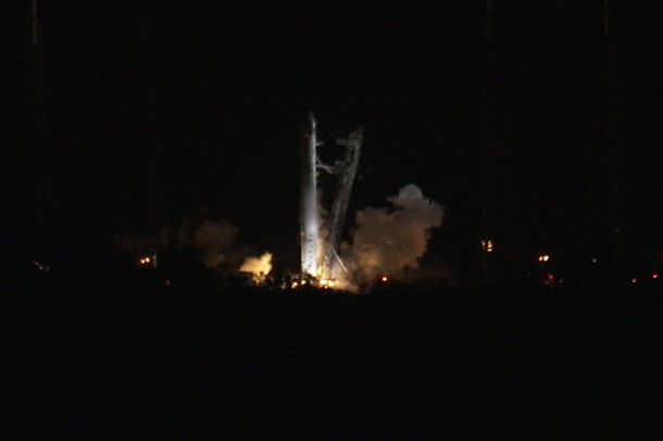 The SpaceX Falcon 9 rocket ignites its nine engines for a few seconds before shutting them down. Photo credit: NASA TV The SpaceX Falcon 9 rocket ignites its nine engines for a few seconds before shutting them down. Photo credit: NASA TV
