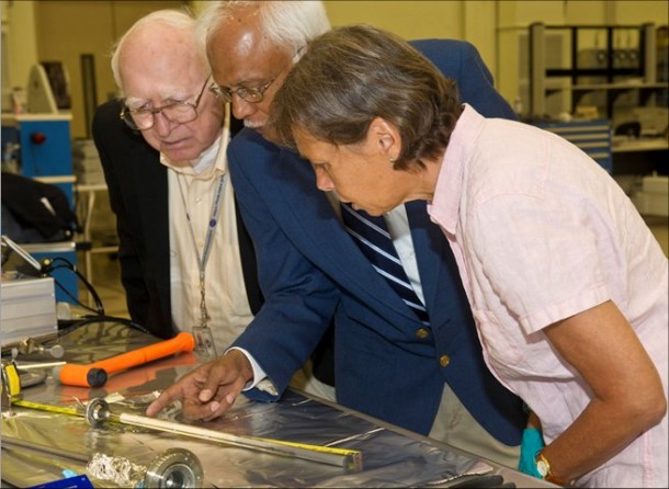 From left to right: Alex Lehoczky, project scientist at the Marshall Space Flight Center, Surendra Tewari, professor at Cleveland State University, Cleveland, Ohio, and Petra Neuhause with Astrium, Germany examine the first U.S. sample processed in the solidification quench furnace in the Materials Science Research Rack. The sample was returned to the ground via STS-133 and SpaceX's Dragon is expected to bring back similar samples when it returns to Earth. (NASA) From left to right: Alex Lehoczky, project scientist at the Marshall Space Flight Center, Surendra Tewari, professor at Cleveland State University, Cleveland, Ohio, and Petra Neuhause with Astrium, Germany examine the first U.S. sample processed in the solidification quench furnace in the Materials Science Research Rack. The sample was returned to the ground via STS-133 and SpaceX's Dragon is expected to bring back similar samples when it returns to Earth. (NASA)