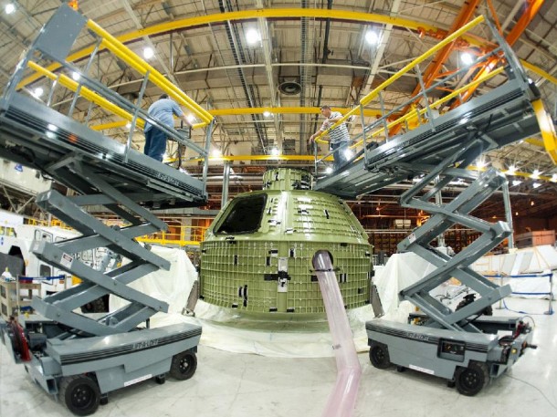 At NASA’s Michoud Assembly Facility in Louisiana, the first space-bound Orion capsule is packed up for shipment to the Kennedy Space Center for final processing and outfitting. This spacecraft will fly on Exploration Flight Test-1 in 2014. Photo credit: NASA At NASA’s Michoud Assembly Facility in Louisiana, the first space-bound Orion capsule is packed up for shipment to the Kennedy Space Center for final processing and outfitting. This spacecraft will fly on Exploration Flight Test-1 in 2014. Photo credit: NASA