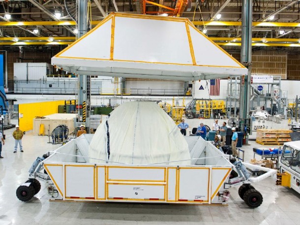 At NASA’s Michoud Assembly Facility in Louisiana, the first space-bound Orion capsule is packed up for shipment to the Kennedy Space Center for final processing and outfitting. This spacecraft will fly on Exploration Flight Test-1 in 2014. Photo credit: NASA At NASA’s Michoud Assembly Facility in Louisiana, the first space-bound Orion capsule is packed up for shipment to the Kennedy Space Center for final processing and outfitting. This spacecraft will fly on Exploration Flight Test-1 in 2014. Photo credit: NASA