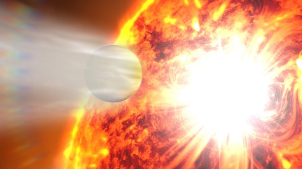This artist's rendering illustrates the evaporation of HD 189733b's atmosphere in response to a powerful eruption from its host star. NASA's Hubble Space Telescope detected the escaping gases and NASA's Swift satellite caught the stellar flare. (Credit: NASA's Goddard Space Flight Center) This artist's rendering illustrates the evaporation of HD 189733b's atmosphere in response to a powerful eruption from its host star. NASA's Hubble Space Telescope detected the escaping gases and NASA's Swift satellite caught the stellar flare. (Credit: NASA's Goddard Space Flight Center)