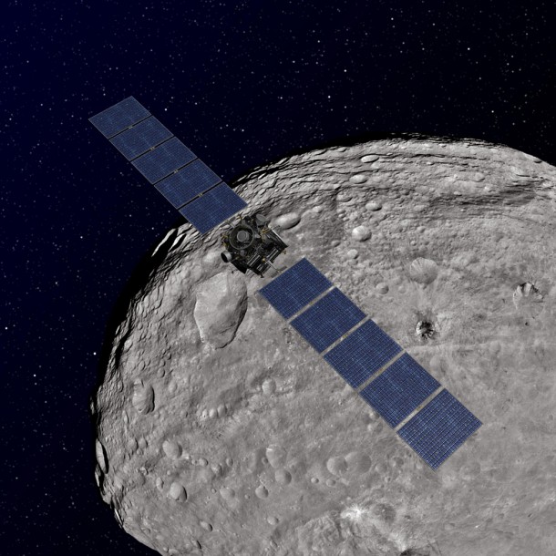 This artist's concept shows NASA's Dawn spacecraft orbiting the giant asteroid Vesta. The depiction of Vesta is based on images obtained by Dawn's framing cameras. Image credit: NASA/JPL-Caltech This artist's concept shows NASA's Dawn spacecraft orbiting the giant asteroid Vesta. The depiction of Vesta is based on images obtained by Dawn's framing cameras. Image credit: NASA/JPL-Caltech