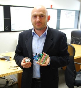 Peter Platzer, CEO of NanoSatisfi, holding a prototype of the payload package