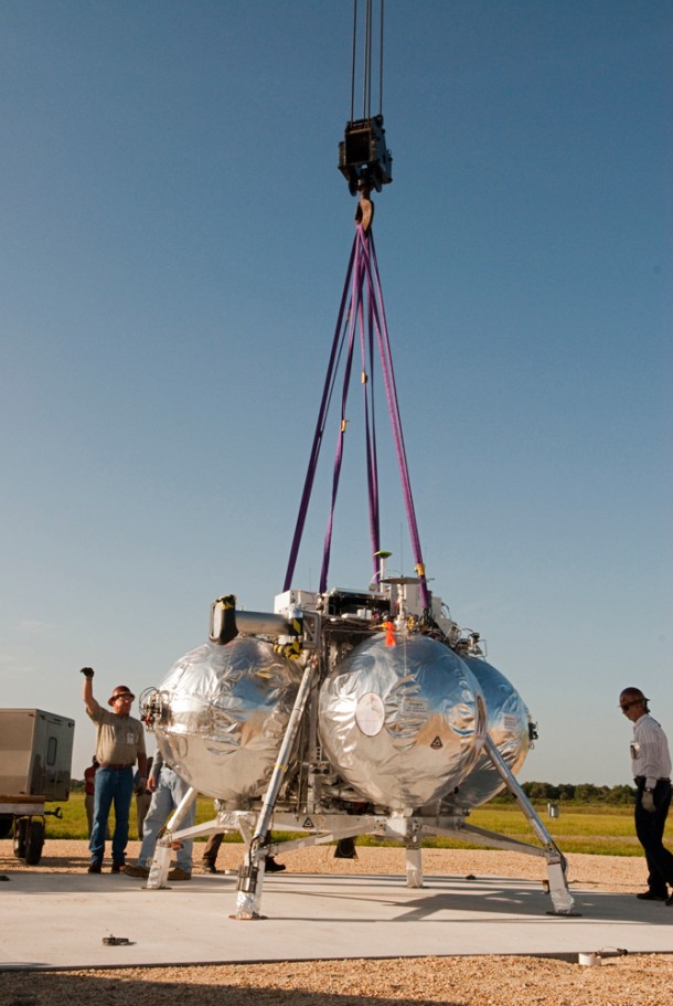A tethered test of the Project Morpheus lander is conducted at NASA's Kennedy Space Center on Aug. 3, 2012. Photo credit: NASA/Kim Shiflett A tethered test of the Project Morpheus lander is conducted at NASA's Kennedy Space Center on Aug. 3, 2012. Photo credit: NASA/Kim Shiflett