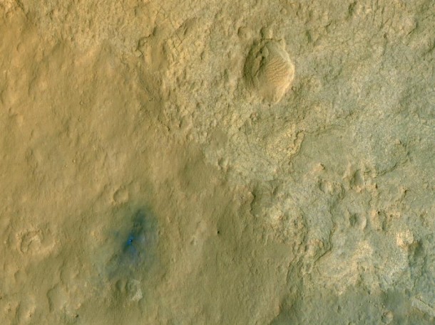 This color-enhanced view shows NASA's Curiosity rover on the surface of Mars. It was taken by the High Resolution Imaging Science Experiment (HiRISE) on NASA's Mars Reconnaissance Orbiter. Image credit: NASNASA/JPL-Caltech/University of Arizona This color-enhanced view shows NASA's Curiosity rover on the surface of Mars. It was taken by the High Resolution Imaging Science Experiment (HiRISE) on NASA's Mars Reconnaissance Orbiter. Image credit: NASNASA/JPL-Caltech/University of Arizona