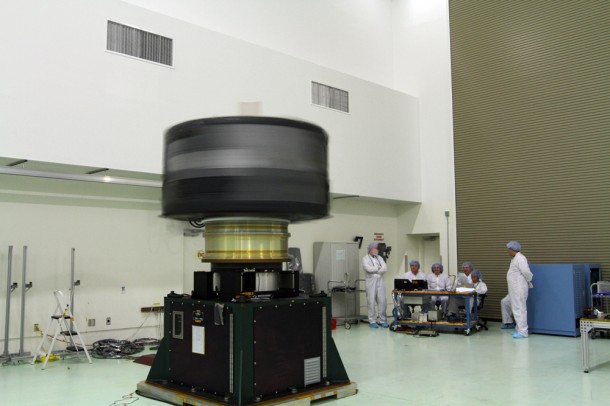Spacecraft A, one of two Radiation Belt Storm Probes, is checked for proper balance during a spin test. Photo credit: NASA/Charisse Nahser Spacecraft A, one of two Radiation Belt Storm Probes, is checked for proper balance during a spin test. Photo credit: NASA/Charisse Nahser