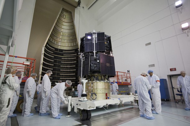 Technicians at the Astrotech payload processing facility prepare the RBSP spacecraft for encapsulation in the payload fairing. Photo credit: NASA/Kim Shiflett Technicians at the Astrotech payload processing facility prepare the RBSP spacecraft for encapsulation in the payload fairing. Photo credit: NASA/Kim Shiflett