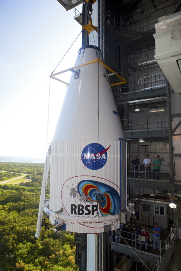The Atlas V payload fairing containing the RBSP spacecraft is lifted at Space Launch Complex-41, where the booster awaits. Photo credit: NASA/Dimitri Gerondidakis The Atlas V payload fairing containing the RBSP spacecraft is lifted at Space Launch Complex-41, where the booster awaits. Photo credit: NASA/Dimitri Gerondidakis
