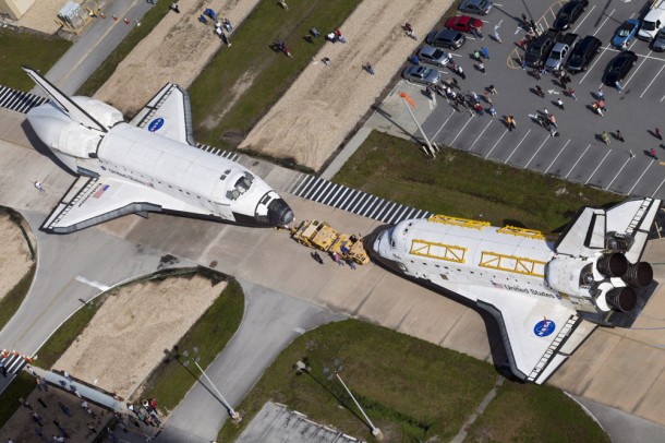Space shuttles Endeavour, left, and Atlantis are parked nose-to-nose for a brief photo opportunity. The shuttles are trading locations with Endeavour headed to the Vehicle Assembly Building and Atlantis moving to Bay 2 of the Orbiter Processing Facility. Photo credit: NASA/ Frankie Martin Space shuttles Endeavour, left, and Atlantis are parked nose-to-nose for a brief photo opportunity. The shuttles are trading locations with Endeavour headed to the Vehicle Assembly Building and Atlantis moving to Bay 2 of the Orbiter Processing Facility. Photo credit: NASA/ Frankie Martin