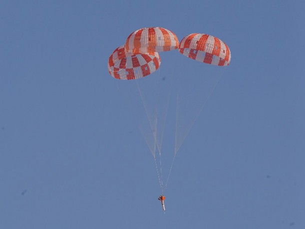 A dart-shaped test vehicle that is used to simulate Orion’s parachute compartment descends above the skies of the U.S. Yuma Army Proving Ground in Arizona. Engineers were testing the maximum pressure Orion’s chutes might face when returning from exploration missions. Photo credit: NASA A dart-shaped test vehicle that is used to simulate Orion’s parachute compartment descends above the skies of the U.S. Yuma Army Proving Ground in Arizona. Engineers were testing the maximum pressure Orion’s chutes might face when returning from exploration missions. Photo credit: NASA