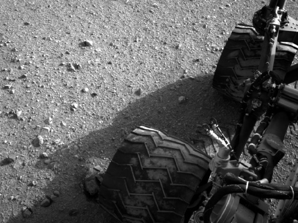 Soil clinging to the right middle and rear wheels of NASA's Mars rover Curiosity can be seen in this image taken by the Curiosity's Navigation Camera after the rover's third drive on Mars. Image credit: NASA/JPL-Caltech Soil clinging to the right middle and rear wheels of NASA's Mars rover Curiosity can be seen in this image taken by the Curiosity's Navigation Camera after the rover's third drive on Mars. Image credit: NASA/JPL-Caltech
