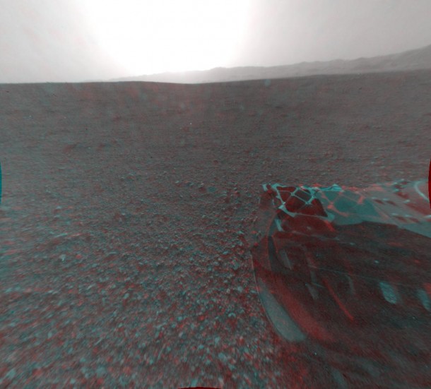 This image is a 3-D view behind NASA's Curiosity rover, which landed on Mars on Aug. 5 PDT (Aug. 6 EDT). The anaglyph was made from a stereo pair of Hazard-Avoidance Cameras on the rear of the rover. It has been cropped. Image credit: NASA/JPL-Caltech This image is a 3-D view behind NASA's Curiosity rover, which landed on Mars on Aug. 5 PDT (Aug. 6 EDT). The anaglyph was made from a stereo pair of Hazard-Avoidance Cameras on the rear of the rover. It has been cropped. Image credit: NASA/JPL-Caltech