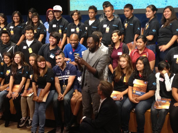 With students and NASA space shuttle astronaut Leland Melvin looking on, musical artist will.i.am posts a tweet soon after his song "Reach for the Stars" is beamed back from the Curiosity Mars rover and broadcast to a live audience at NASA's Jet Propulsion Laboratory in Pasadena, Calif. Image credit: NASA/JPL-Caltech With students and NASA space shuttle astronaut Leland Melvin looking on, musical artist will.i.am posts a tweet soon after his song "Reach for the Stars" is beamed back from the Curiosity Mars rover and broadcast to a live audience at NASA's Jet Propulsion Laboratory in Pasadena, Calif. Image credit: NASA/JPL-Caltech