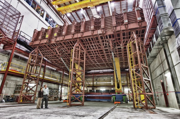Scientists and engineers at Fermi National Accelerator Laboratory developed the 750,000-pound pivoter machine that will put the blocks of the NOvA detector in place. Photo by Fermilab. Scientists and engineers at Fermi National Accelerator Laboratory developed the 750,000-pound pivoter machine that will put the blocks of the NOvA detector in place. Photo by Fermilab.