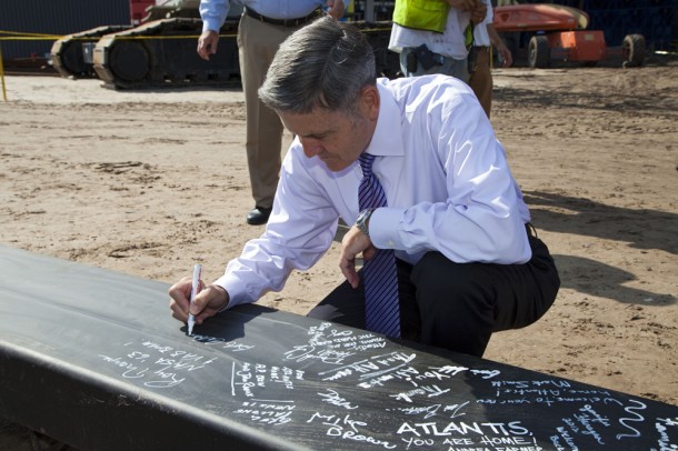 Bob Cabana, director of Kennedy Space Center and a former astronaut, signs the steel beam before it is placed. Image credit: NASA/Kim Shiflett Bob Cabana, director of Kennedy Space Center and a former astronaut, signs the steel beam before it is placed. Image credit: NASA/Kim Shiflett