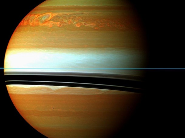 These red, orange and green clouds (false color) in Saturn's northern hemisphere indicate the tail end of a massive storm that started in December 2010. Even after visible signs of the storm started to fade, infrared measurements continued to reveal powerful effects at work in Saturn's stratosphere. Image credit:NASA/JPL-Caltech/Space Science Institute These red, orange and green clouds (false color) in Saturn's northern hemisphere indicate the tail end of a massive storm that started in December 2010. Even after visible signs of the storm started to fade, infrared measurements continued to reveal powerful effects at work in Saturn's stratosphere. Image credit:NASA/JPL-Caltech/Space Science Institute