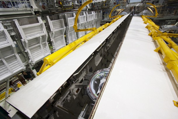 The right payload bay door closes on space shuttle Atlantis. Photo credit: NASA/Jim Grossmann The right payload bay door closes on space shuttle Atlantis. Photo credit: NASA/Jim Grossmann