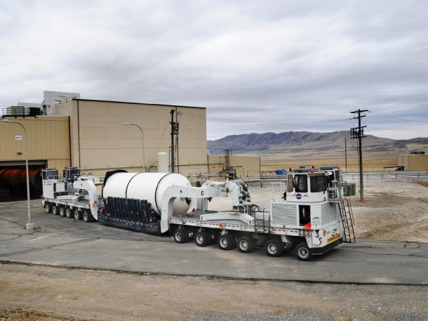 The forward segment of the qualification motor for NASA'S Space Launch System is transported through manufacturing and assembly at ATK's facility in Promontory, Utah in preparation for a full-scale ground test there next spring. (ATK) The forward segment of the qualification motor for NASA'S Space Launch System is transported through manufacturing and assembly at ATK's facility in Promontory, Utah in preparation for a full-scale ground test there next spring. (ATK)