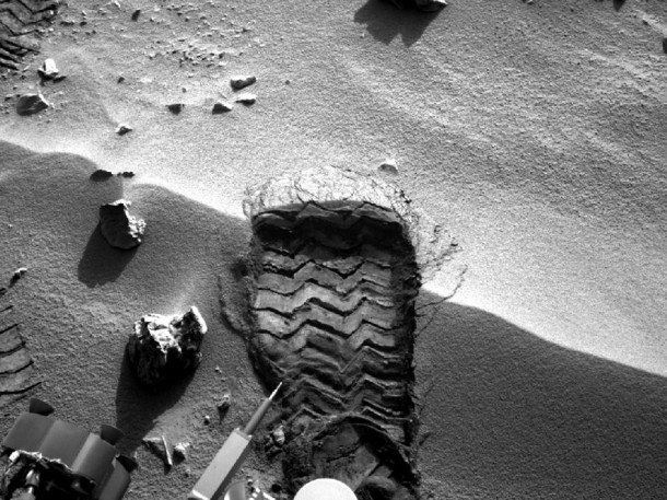 NASA's Mars rover Curiosity cut a wheel scuff mark into a wind-formed ripple at the "Rocknest" site to give researchers a better opportunity to examine the particle-size distribution of the material forming the ripple. Image Credit: NASA/JPL-Caltech NASA's Mars rover Curiosity cut a wheel scuff mark into a wind-formed ripple at the "Rocknest" site to give researchers a better opportunity to examine the particle-size distribution of the material forming the ripple. Image Credit: NASA/JPL-Caltech