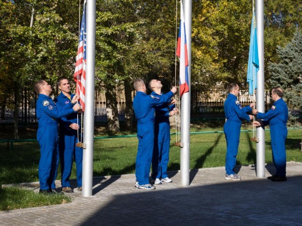 The Expedition 33 prime and backup crew members participate in traditional flag-raising ceremonies outside their Cosmonaut Hotel crew quarters in Baikonur, Kazakhstan. Credit: NASA The Expedition 33 prime and backup crew members participate in traditional flag-raising ceremonies outside their Cosmonaut Hotel crew quarters in Baikonur, Kazakhstan. Credit: NASA