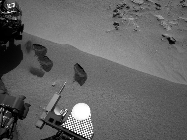 Three bite marks left in the Martian ground by the scoop on the robotic arm of NASA's Mars rover Curiosity are visible in this image taken by the rover's right Navigation Camera during the mission's 69th Martian day, or sol (Oct. 15, 2012). Image credit: NASA/JPL-Caltech Three bite marks left in the Martian ground by the scoop on the robotic arm of NASA's Mars rover Curiosity are visible in this image taken by the rover's right Navigation Camera during the mission's 69th Martian day, or sol (Oct. 15, 2012). Image credit: NASA/JPL-Caltech
