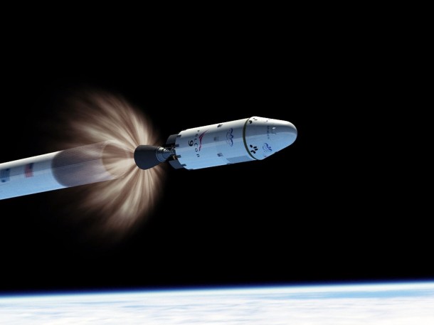 This artist concept shows the second stage engine of a SpaceX Falcon 9 rocket igniting to send the company's Dragon capsule into orbit as the first stage falls away. Image credit: SpaceX This artist concept shows the second stage engine of a SpaceX Falcon 9 rocket igniting to send the company's Dragon capsule into orbit as the first stage falls away. Image credit: SpaceX