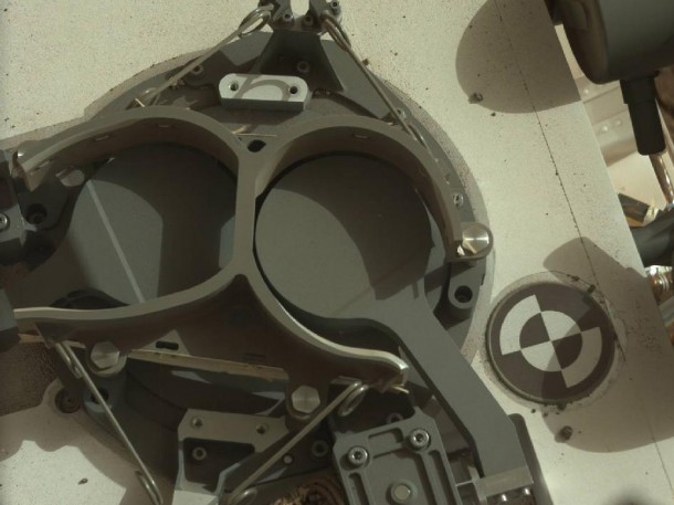 This subframe image from the left Mast Camera (Mastcam) on NASA's Mars rover Curiosity shows the covers in place over two sample inlet funnels of the rover's Sample Analysis at Mars (SAM) instrument suite. Image Credit: NASA/JPL-Caltech/MSSS This subframe image from the left Mast Camera (Mastcam) on NASA's Mars rover Curiosity shows the covers in place over two sample inlet funnels of the rover's Sample Analysis at Mars (SAM) instrument suite. Image Credit: NASA/JPL-Caltech/MSSS