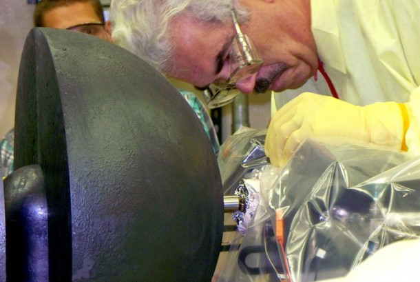 John Bounds of Los Alamos National Laboratory's Advanced Nuclear Technology Division makes final adjustments on the DUFF experiment, a demonstration of a simple, robust fission reactor prototype that could be used as a power system for space travel. DUFF is the first demonstration of a space nuclear reactor system to produce electricity in the United States since 1965. John Bounds of Los Alamos National Laboratory's Advanced Nuclear Technology Division makes final adjustments on the DUFF experiment, a demonstration of a simple, robust fission reactor prototype that could be used as a power system for space travel. DUFF is the first demonstration of a space nuclear reactor system to produce electricity in the United States since 1965.