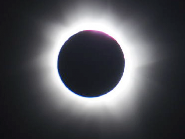 A total solar eclipse was visible from the Northern tip of Australia on Nov. 13, 2012 at 3:35 EST. The light halo visible around the edges of the moon is the sun's atmosphere, the corona. Credit: NASA/Cirtain A total solar eclipse was visible from the Northern tip of Australia on Nov. 13, 2012 at 3:35 EST. The light halo visible around the edges of the moon is the sun's atmosphere, the corona. Credit: NASA/Cirtain