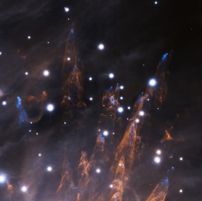 Caption: This image, obtained during the late commissioning phase of the GeMS adaptive optics system, with the Gemini South AO Imager (GSAOI) on the night of Dec. 28, 2012, reveals exquisite details in the outskirts of the Orion Nebula. The large adaptive optics field-of-view (85 arcseconds across) demonstrates the system's extreme resolution and uniform correction across the entire field. Credit: Gemini Observatory/AURA Caption: This image, obtained during the late commissioning phase of the GeMS adaptive optics system, with the Gemini South AO Imager (GSAOI) on the night of Dec. 28, 2012, reveals exquisite details in the outskirts of the Orion Nebula. The large adaptive optics field-of-view (85 arcseconds across) demonstrates the system's extreme resolution and uniform correction across the entire field. Credit: Gemini Observatory/AURA