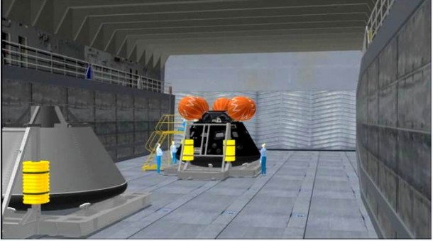 An Orion crew module has been positioned on a GSDO-provided stand, called a recovery cradle, in the LPD well deck. In this artist’s concept, the NASA recovery team is positioning the stand to allow access and assist the crew in getting out of the spacecraft. Image credit: NASA An Orion crew module has been positioned on a GSDO-provided stand, called a recovery cradle, in the LPD well deck. In this artist’s concept, the NASA recovery team is positioning the stand to allow access and assist the crew in getting out of the spacecraft. Image credit: NASA