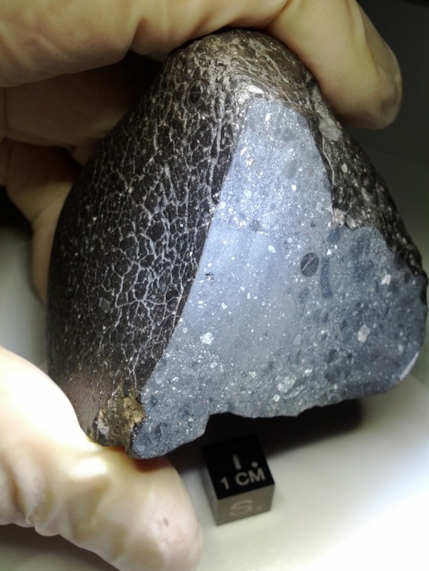 Designated Northwest Africa (NWA) 7034, and nicknamed "Black Beauty," the Martian meteorite weighs approximately 11 ounces (320 grams). Credit: NASA Designated Northwest Africa (NWA) 7034, and nicknamed "Black Beauty," the Martian meteorite weighs approximately 11 ounces (320 grams). Credit: NASA