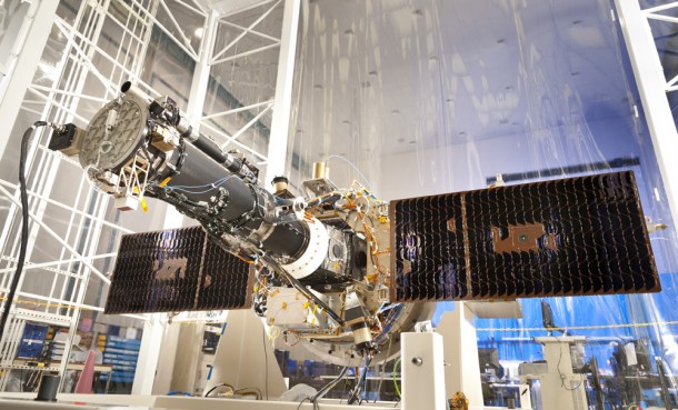 The fully integrated spacecraft and science instrument for NASA's Interface Region Imaging Spectrograph (IRIS) mission is seen in a clean room at the Lockheed Martin Space Systems Sunnyvale, Calif. facility. The solar arrays are deployed in the configuration they will assume when in orbit. Credit: Lockheed Martin The fully integrated spacecraft and science instrument for NASA's Interface Region Imaging Spectrograph (IRIS) mission is seen in a clean room at the Lockheed Martin Space Systems Sunnyvale, Calif. facility. The solar arrays are deployed in the configuration they will assume when in orbit. Credit: Lockheed Martin