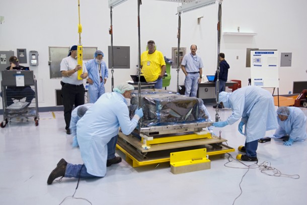 Workers inside the Space Station Processing Facility at Kennedy Space Center position the orbital replacement unit for the space station's main bus switching unit as they prepare to pack the unit in a shipping container Dec. 4. The unit, which was processed at Kennedy, will be shipped to Japan for the HTV-4 launch, which currently is scheduled later this month. Image credit: NASA/Charisse Nahser Workers inside the Space Station Processing Facility at Kennedy Space Center position the orbital replacement unit for the space station's main bus switching unit as they prepare to pack the unit in a shipping container Dec. 4. The unit, which was processed at Kennedy, will be shipped to Japan for the HTV-4 launch, which currently is scheduled later this month. Image credit: NASA/Charisse Nahser