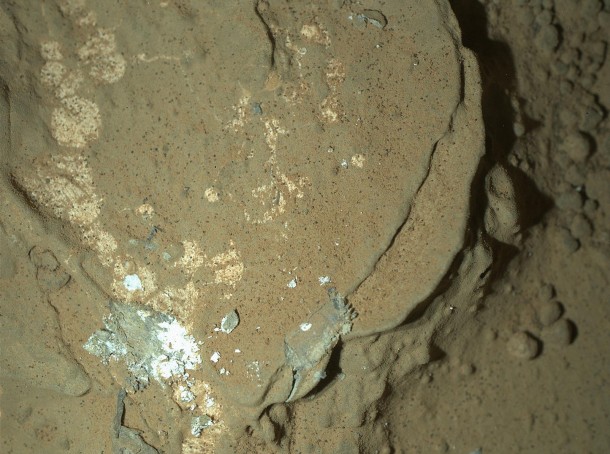 MAHLI's First Night Imaging of Martian Rock, White Lighting This image of a Martian rock illuminated by white-light LEDs (light emitting diodes) is part of the first set of nighttime images taken by the Mars Hand Lens Imager (MAHLI) camera at the end of the robotic arm of NASA's Mars rover Curiosity. Image Credit: NASA/JPL-Caltech/MSSS MAHLI's First Night Imaging of Martian Rock, White Lighting This image of a Martian rock illuminated by white-light LEDs (light emitting diodes) is part of the first set of nighttime images taken by the Mars Hand Lens Imager (MAHLI) camera at the end of the robotic arm of NASA's Mars rover Curiosity. Image Credit: NASA/JPL-Caltech/MSSS