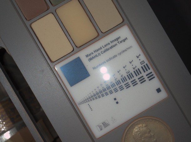 This image of a calibration target illuminated by white-light LEDs (light emitting diodes) is part of the first set of nighttime images taken by the Mars Hand Lens Imager (MAHLI) camera at the end of the robotic arm of NASA's Mars rover Curiosity. Image Credit: NASA/JPL-Caltech/MSSS This image of a calibration target illuminated by white-light LEDs (light emitting diodes) is part of the first set of nighttime images taken by the Mars Hand Lens Imager (MAHLI) camera at the end of the robotic arm of NASA's Mars rover Curiosity. Image Credit: NASA/JPL-Caltech/MSSS