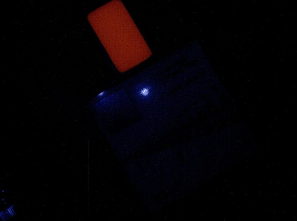 This image of a calibration target illuminated by ultraviolet LEDs (light emitting diodes) is part of the first set of nighttime images taken by the Mars Hand Lens Imager (MAHLI) camera at the end of the robotic arm of NASA's Mars rover Curiosity. Image Credit: NASA/JPL-Caltech/MSSS This image of a calibration target illuminated by ultraviolet LEDs (light emitting diodes) is part of the first set of nighttime images taken by the Mars Hand Lens Imager (MAHLI) camera at the end of the robotic arm of NASA's Mars rover Curiosity. Image Credit: NASA/JPL-Caltech/MSSS